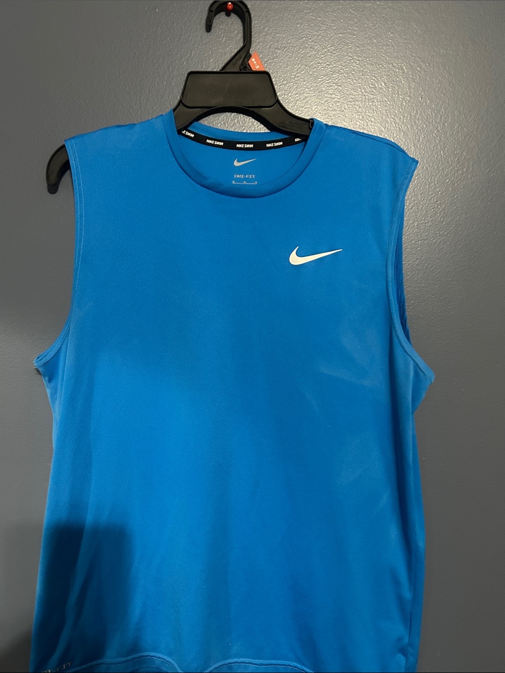 Nike Men’s Bright Blue Sleeveless Swim Rash Guard with White Swoosh